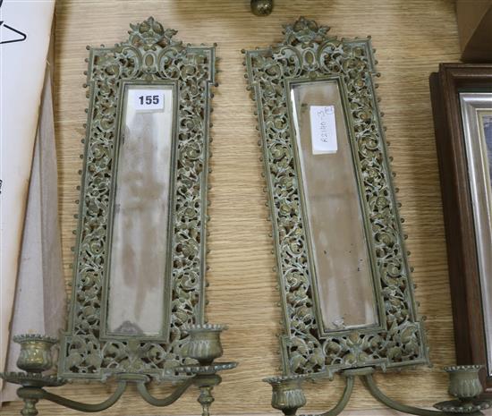 A French fan-shaped firescreen and a pair of brass girandole mirrors